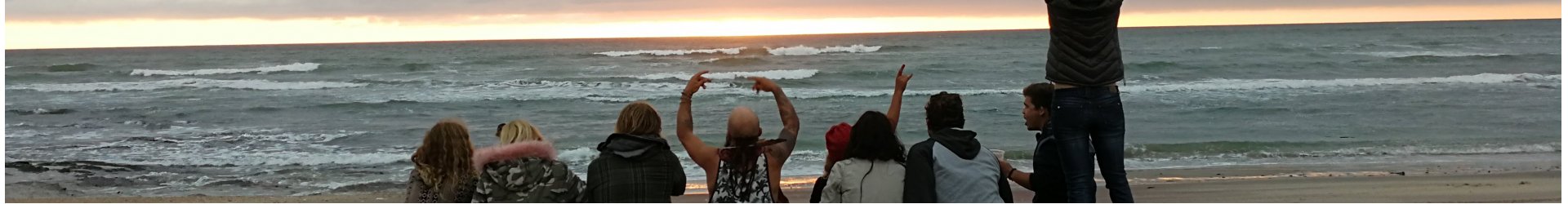 local-travel-namibia-car-rental-our-clients-page-cover-image-group-of-friends-enjoying-sunset